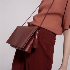 Building block fold tassel bag